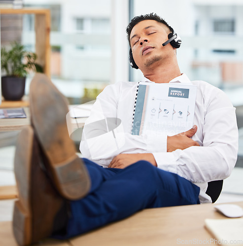 Image of Sales man, sleeping and headset at office desk from reading annual report documents, finance paperwork or taxes. Nap, burnout and tired financial consultant exhausted from business economy consulting