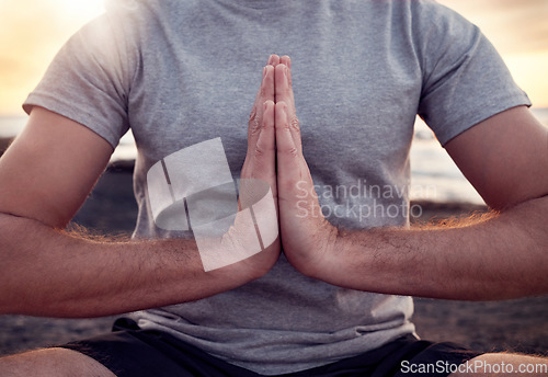 Image of Prayer, hands or praying in yoga meditation exercise or body training with peace, gratitude or chakra healing energy. Nature, God or zen yogi relaxing in a calm lotus pose for spiritual mindfulness