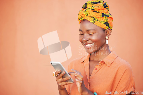 Image of Black woman, head scarf and smartphone for connection, communication and reading online on studio background. Jamaican lady, phone and girl smile with traditional head wrap, marketing and mockup.