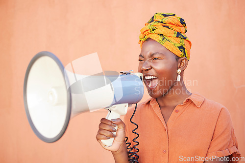 Image of Megaphone, black woman or african protest, justice and freedom of speech for gender equality on orange mockup. Vote, human rights and race of woman with voice for politics, angry broadcast or news