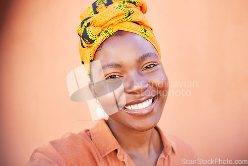 Image of Face, portrait and selfie of black woman in turban in studio on an orange mockup background. Fashion, makeup and female from Nigeria taking pictures for happy memory, social media or profile picture.