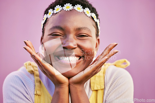 Image of Happy, gen z and black woman student portrait with hippie daisy headband and optimistic smile. Happiness, youth and natural face of young girl in Los Angeles, USA at pink wall background.