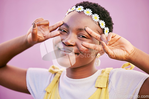 Image of Portrait, peace or face of happy black woman with smile, sunflower crown or positive success mindset. Purple wall, hands or African gen z girl on holiday vacation with cool fashion, pride or freedom