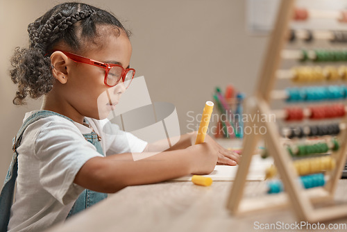 Image of Education, girl or student drawing on paper or writing homework in notebook with artistic creativity. Development, learning or kindergarten school child with creative talent, concentration or focus