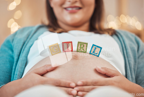 Image of Pregnancy, mother pregnant and building blocks for child gender reveal of girl daughter. Future mom, healthy kid and prenatal woman with hands on stomach for baby love, bonding and pain relief care