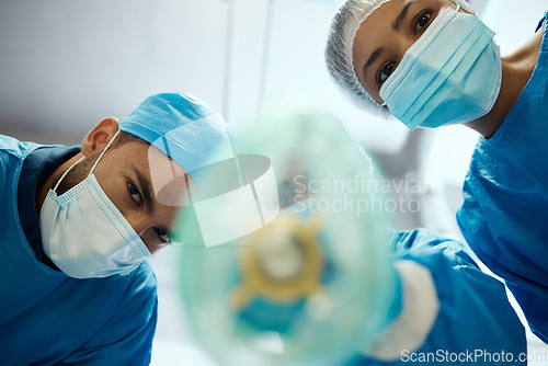 Image of Health, surgeon and anesthesia, doctors and surgery with medical and cardiovascular healthcare, face mask and low angle view. Medicine, operation and health care team, cardiology and hospital.