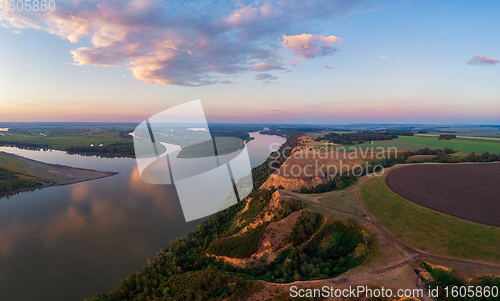 Image of Aerial drone view of river landscape in sunny summer evening