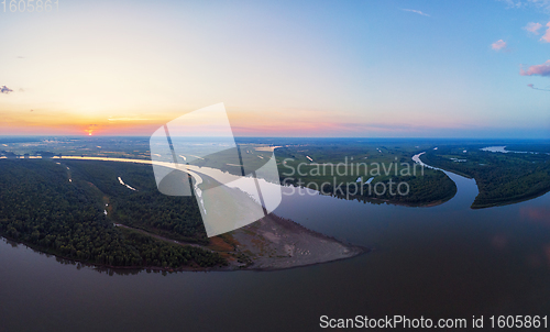 Image of Aerial drone view of river landscape in sunny summer evening