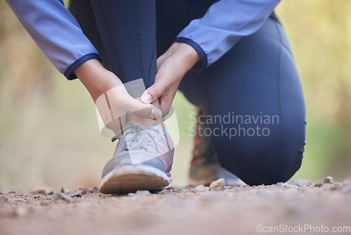 Image of Running, ankle pain and injury with shoes of black woman on nature trail for training, jogging and endurance. Sprain, accident and broken with girl runner on path for workout, exercise and sports