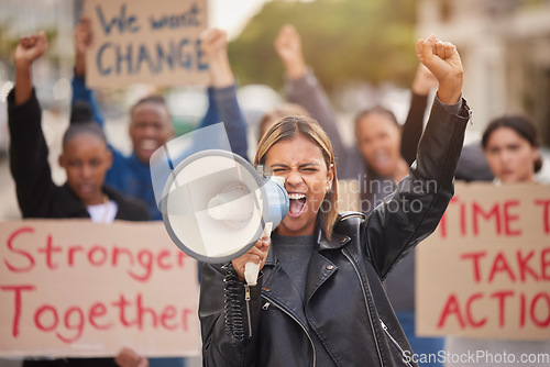 Image of Protest, megaphone and shouting with woman in support for social justice, change and politics fight. Revolution, government and freedom with girl in crowd for future, human rights and equality