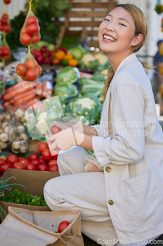 Image of Asian woman, supermarket and grocery shopping and tomato, customer and retail, vegetable fresh product and buying food at store. Young happy female and smile, sale and discount on groceries at market