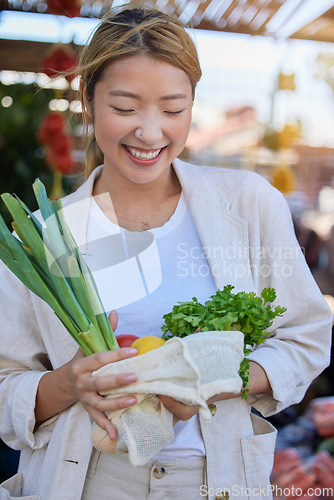 Image of Vegetables, market and happy customer or woman with nutrition, healthy food and grocery shopping sale, discount and promotion. Asian person with vegan, eco friendly and sustainable groceries at store