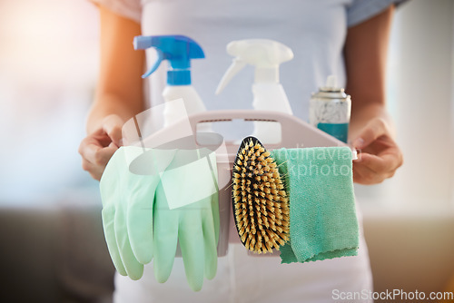 Image of Woman, hands or cleaning container with spray bottle, rubber gloves or fabric for hygiene maintenance, virus security or compliance. Zoom, maid or cleaner service worker with product for housekeeping