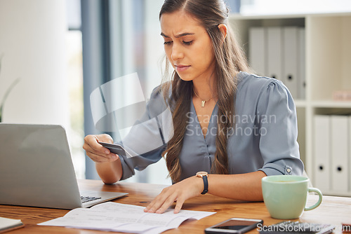 Image of Credit card, laptop and business woman in office with finance, fintech and banking software for loan application, budget and ecommerce. Accountant, corporate and worker invoice, document and payment