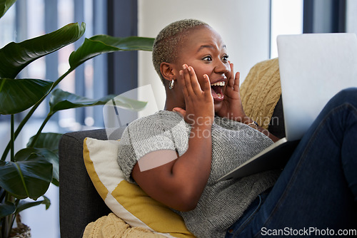 Image of Laptop, surprise and excited black woman on sofa shocked with win of digital lottery, competition or award. Wow news, prize winner and girl on gambling website play online poker, bingo or casino game