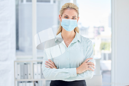 Image of Business woman, arms crossed and covid in modern office compliance, bacteria safety or virus security. Portrait, employee and worker in medical face mask, Canada company or financial planning startup