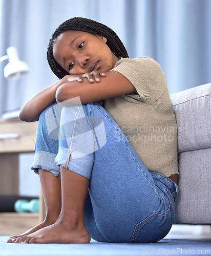 Image of Black woman, sad or depression in house, home or mental health problem for sad news, grief or loss. Anxiety, burnout or psychology stress for girl in living room, depressed or frustrated with mistake