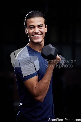 Image of Bodybuilder man, studio portrait and weightlifting with smile for fitness, muscle development and health. Happy bodybuilding athlete, dumbbell and black background for workout, training and self care