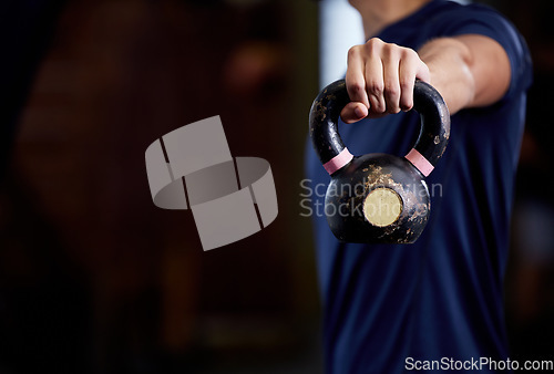 Image of Gym, fitness or hand with kettlebell for training strong arms, powerful bicep muscles or body exercises for balance. Sports, mockup or strong man with hand holding kettle bell weight for a workout