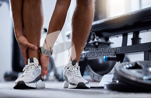 Image of Man legs, fitness and ankle injury in gym for training workout, sports accident or cardio emergency. Athlete person, muscle anatomy or fibromyalgia trauma, joint pain or leg wellness from exercise