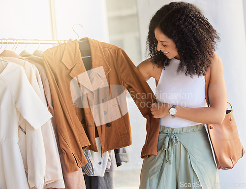 Image of Retail, fashion and shopping with black woman in store buying for spree, luxury and products sale. Discount, consumer and expensive with girl customer in boutique mall spending for clothes deal