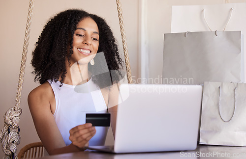 Image of Credit card, laptop and online shopping, payment and bills in home, happy smile and sale promotion, discount and buy. Ecommerce, black woman and internet subscription upgrade, buying and banking