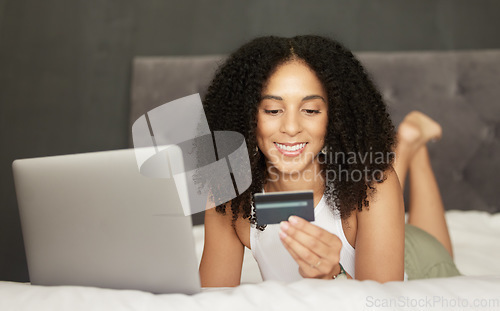 Image of Credit card, online shopping or black woman on bed with laptop for bill payment, ecommerce or investment. Happy, crypto or girl relax in bedroom for trading, bitcoin invest or digital banking app