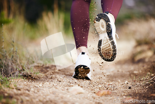 Image of Foot, dirt and running in nature for fitness, exercise and athletic training for health and wellness. Footwear, trail and cardio jogging in running shoes for sporty, physical and healthy lifestyle