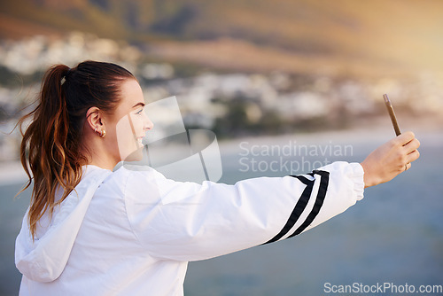 Image of Beach selfie, happy and woman with a phone for video call, communication and social media update on holiday in Bali. Travel influencer, smile and girl with mobile photo on an ocean vacation in summer