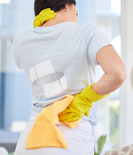 Image of Neck pain, cleaner and woman with injury in home after working hard. Spring cleaning, housekeeper and female with arthritis, back pain or fibromyalgia after disinfecting, washing or sanitizing house.