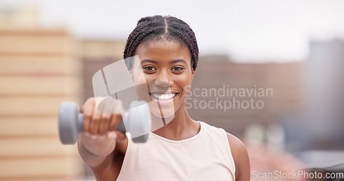 Image of Fitness, gym and portrait of black woman with dumbbell, smile and motivation for wellness and power in training. Sports, muscle building and exercise goals, happy face of woman with energy at workout