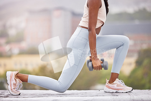 Image of Fitness, woman legs and dumbbells for weightlifting outdoor, weights and body building with training in urban cityscape. Exercise, workout in city and lunges with strong athlete and health wellness.