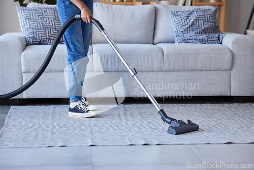 Image of woman, vaccum and cleaning living room floor or carpet for home hygiene, housework and maid spring cleaning. Cleaner, house maintenance and service lady dust dirt on rug or housekeeping in lounge