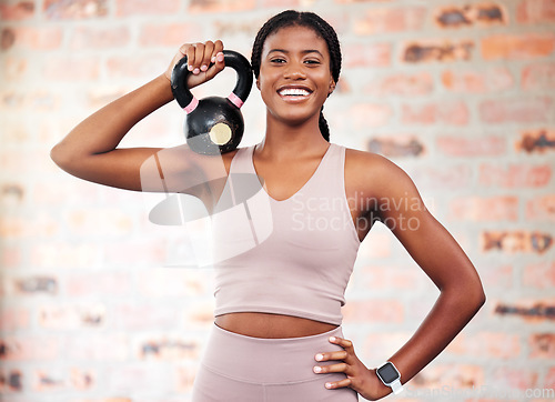 Image of African woman, gym portrait and kettlebell with smile at training, weightlifting and summer body beauty. Black woman bodybuilder, strong or happy mindset for fitness, workout or wellness in Atlanta
