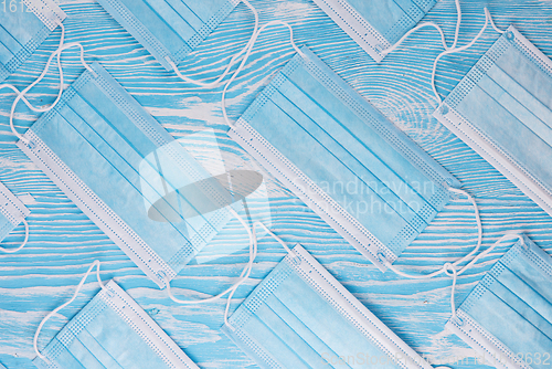 Image of Medical masks on the blue colored background