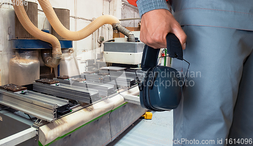 Image of Worker with headphones