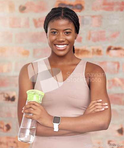 Image of Fitness, portrait or black woman with water bottle to start training routine, cardio exercise or workout. Happy face, gym or healthy sports girl ready for for body goals, target or challenge in Kenya