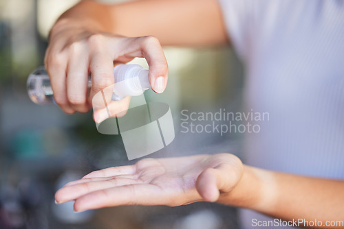 Image of Woman, hands and sanitize for healthcare hygiene or virus disinfectant, covid safety and cleaning bacteria. Spray bottle, clean hand and antibacterial or health compliance with alcohol hand sanitizer