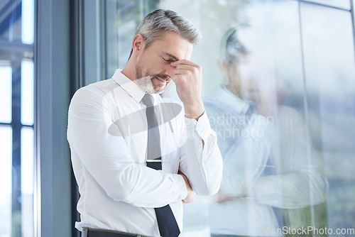 Image of Window, business man and stress with headache, burnout and overworked in office. Senior male, entrepreneur and ceo frustrated, mental health and leader with depression, pain and tired in workplace.