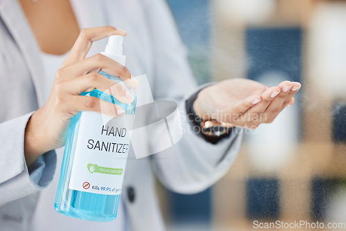 Image of Hand sanitizer, hand and business woman, covid and health, hygiene and cleaning hands at office, disinfect and safety from virus. Covid 19 compliance, disinfection at work with worker and healthcare.