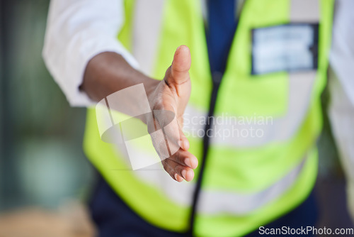 Image of Black man, architect and handshake for b2b, partnership or meeting for introduction at the workplace. Hand of African American male employee engineer for agreement deal, greeting or welcome