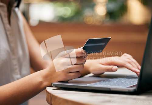 Image of Credit card, woman hands and laptop at cafe for ecommerce payment, fintech money or online shopping. Closeup customer, coffee shop and computer banking, finance and wealth with internet pc technology