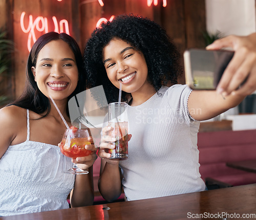 Image of Cocktail, phone or friends taking a selfie for social media content creation on a holiday vacation in a restaurant. Smile, girls or happy women taking pictures with drinks as cool or fun influencers