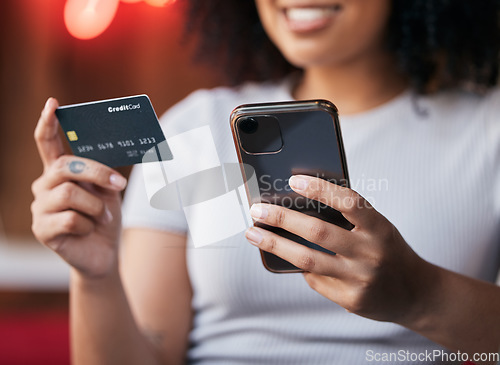 Image of Woman hands, phone and credit card for ecommerce, online shopping and making payment on internet store or bills with fintech app. Female doing banking with secure smartphone network for savings