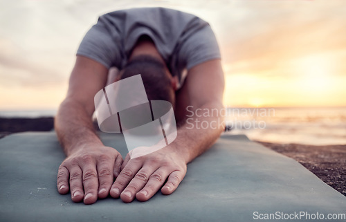 Image of Man hands, meditation and yoga at the beach, peace and zen with spiritual healing and energy balance with exercise outdoor. Fitness, mindfulness and calm with wellness at sunrise, nature and prayer.