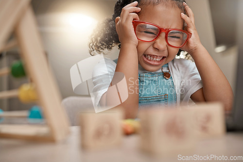 Image of Student, frustrated and learning with education and headache, young child with anxiety, mental health and academic stress. Home school, e learning and study burnout with primary school learner.