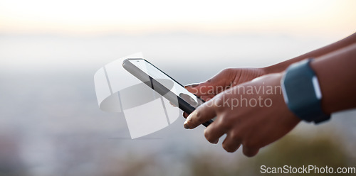 Image of Runner hands, phone and smartwatch for fitness, health or heart rate at training in urban, metro or park. Closeup, smartphone or communication on web app, social media or reading for wellness on rest