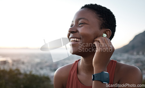 Image of Black woman, laughing face or fitness earphones in sunset workout, healthcare training or cardiovascular exercise in sunrise wellness. Zoom, happy smile or sports runner listening to motivation music