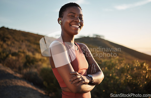 Image of Black woman runner, happy portrait and music earphones in nature, wellness or happiness on hill. Outdoor exercise, streaming or smartwatch for girl on training, running or wellness adventure in peace