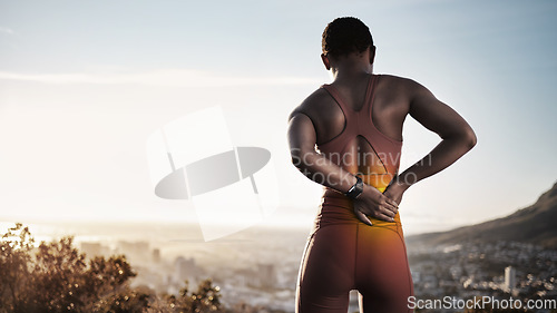 Image of Black woman runner, back pain and exercise in morning, summer and city with skyline, smartwatch and rest. Urban workout, muscle injury or self care for physical therapy in nature, outdoor and running